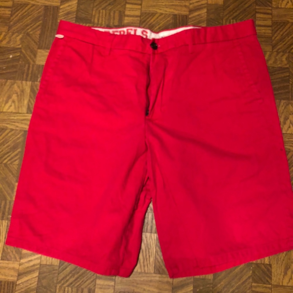 Men’s Dockers red shorts.  36. Ole Miss Rebels